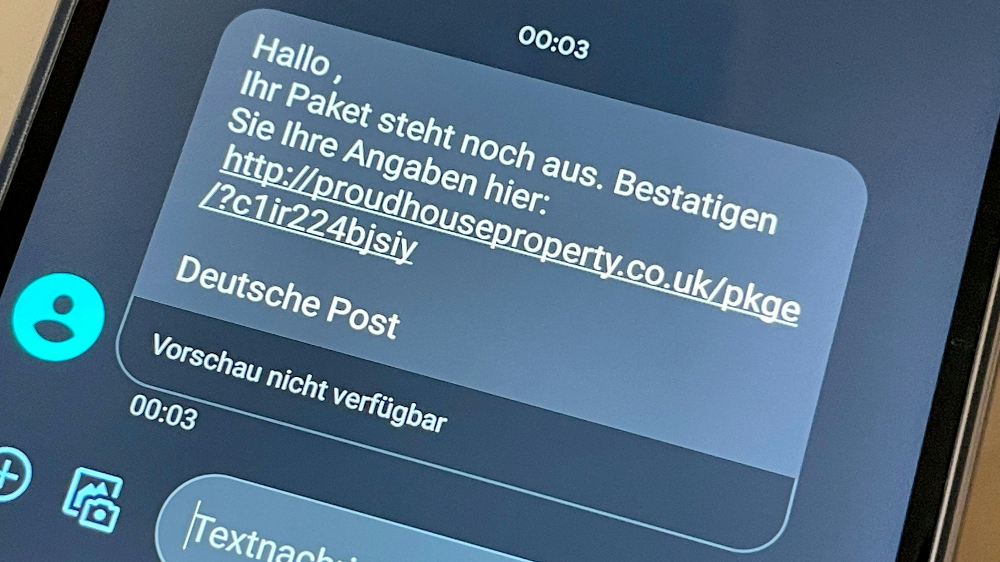 Spam-SMS mit Link über ein angebliches Paket der Deutschen Post.