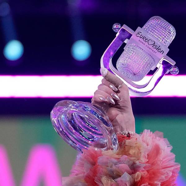 Nemo of Switzerland, who performed the song The Code, celebrates holding the trophy after winning the Grand Final of the Eurovision Song Contest in Malmo, Sweden, Sunday, May 12, 2024. (AP Photo/Martin Meissner)