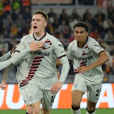 Leverkusen's Florian Wirtz celebrates after scoring their side's first goal of the game during the UEFA Europa League semifinal first leg soccer match between AS Roma and Bayer 04 Leverkusen at the Olympic stadium in Rome, Italy, Thursday, May 2, 2024. (Fabrizio Corradetti/LaPresse via AP)