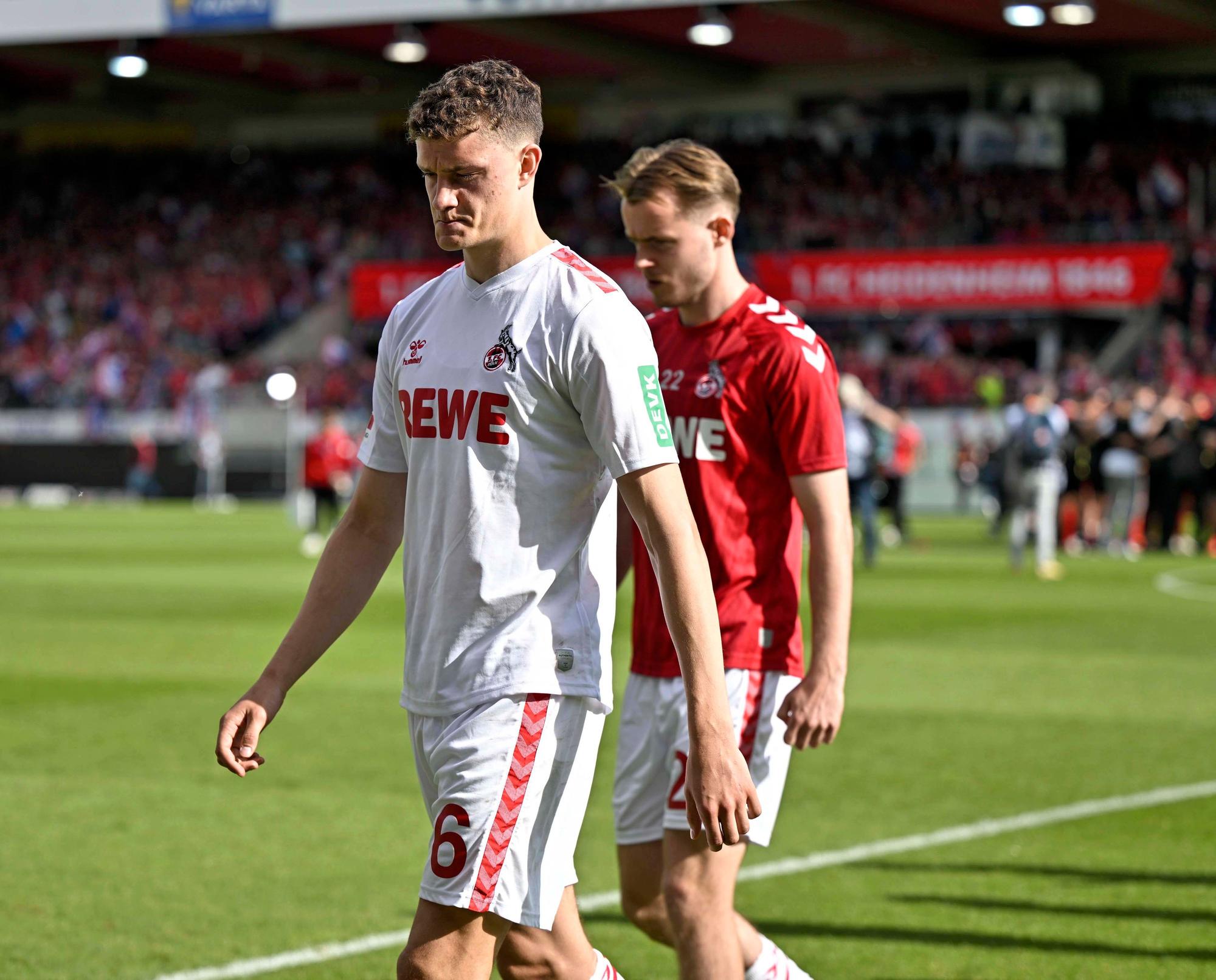 18.05.2024, Fussball 1. Bundesliga 2023/2024, 34.Spieltag, 1.FC Heidenheim - 1.FC Köln, in der Voith-Arena Heidenheim. Die Kölner Spieler sind nach dem Spiel enttäuscht. v.l. Eric Martel Köln und Jacob Christensen Köln ***DFL and DFB regulations prohibit any use of photographs as image sequences and/or quasi-video.*** *** 18 05 2024, Football 1 Bundesliga 2023 2024, Matchday 34, 1 FC Heidenheim 1 FC Köln, in the Voith Arena Heidenheim The Cologne players are disappointed after the match v l Eric Martel Köln and Jacob Christensen Köln DFL and DFB regulations prohibit any use of photographs as image sequences and or quasi video