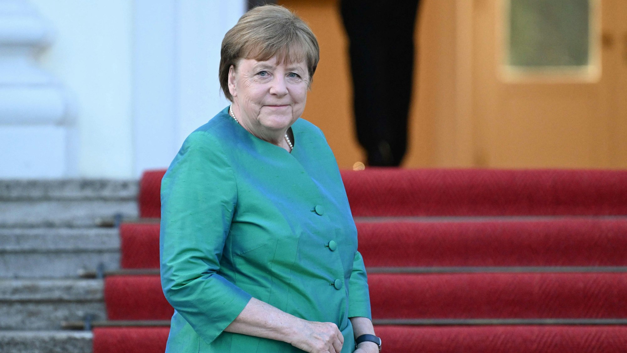 Angela Merkel erschien zum Staatsbankett zu Ehren des Präsidenten von Frankreich Macron komplett in Grün.