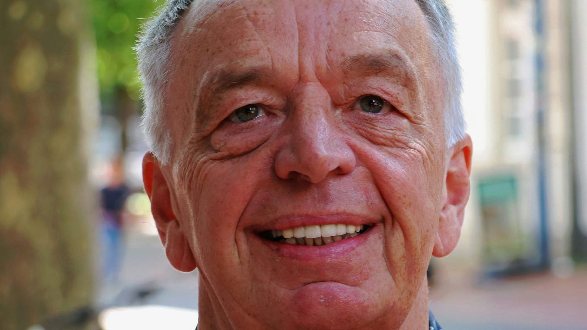 Auf dem Bild ist ein Portrait von Harald Band zu sehen.