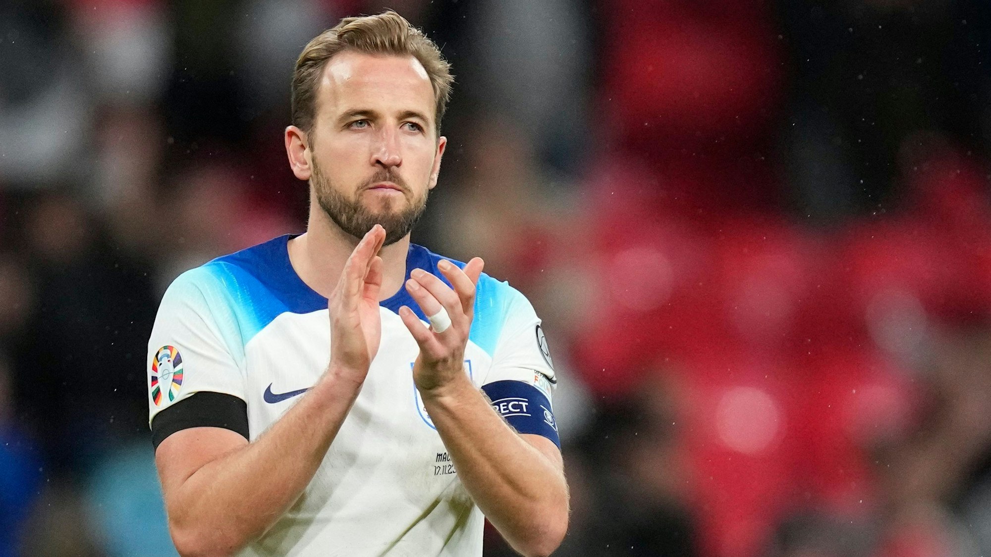 England's Harry Kane applauds at the end of the Euro 2024 group C qualifying soccer match between England and Malta at Wembley stadium in London, Friday, Nov. 17, 2023. Serbia and Slovenia will be hoping for their own fairytales after qualifying for the Euros for the first time in more than two decades.