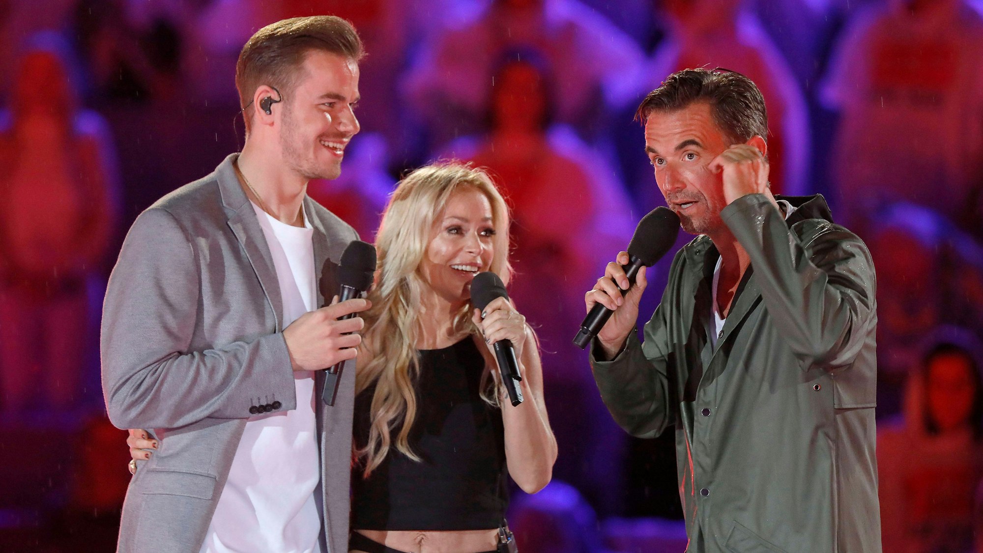 Eric Philippi, Michelle und Florian Silbereisen in der TV-Show „Schlagerbooom Open Air – Die Stadionshow in Österreich“ aus dem Stadion Kitzbühel.
