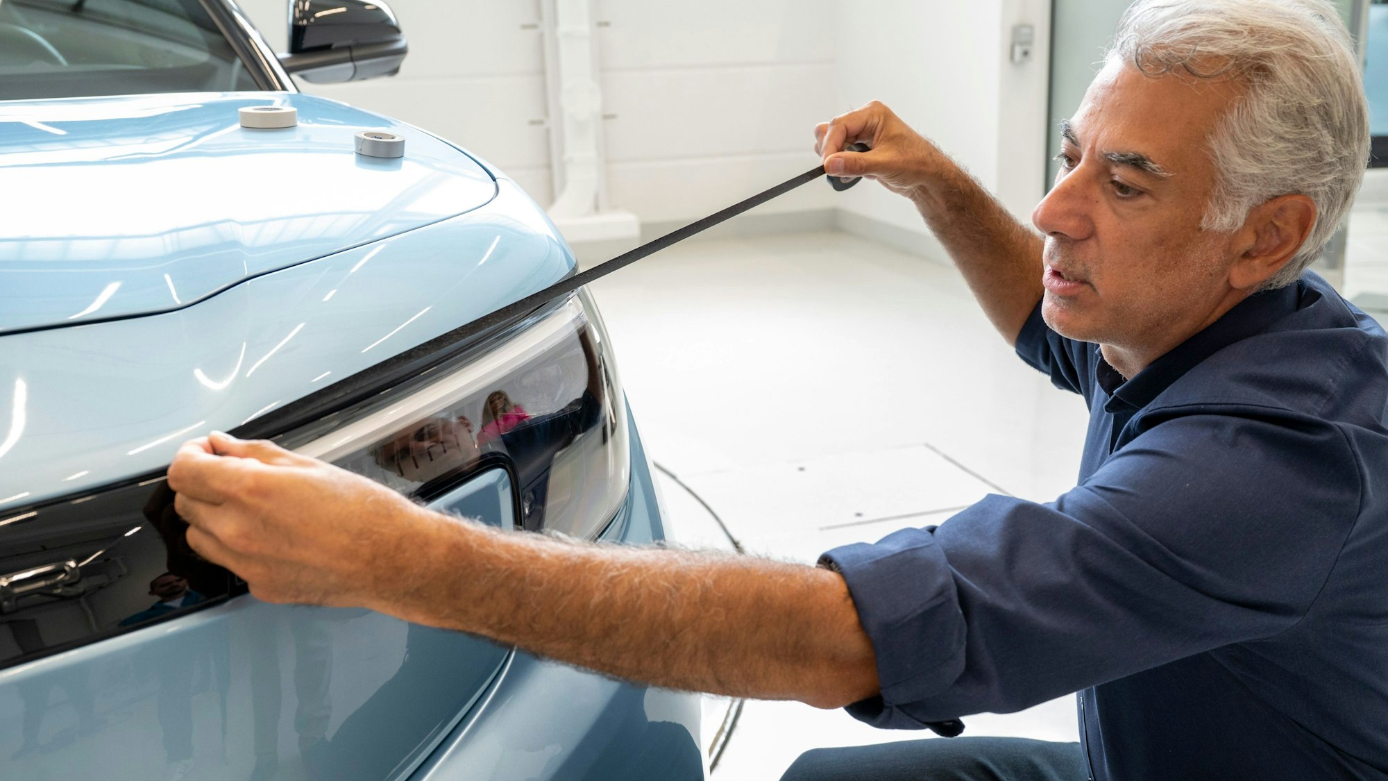 19.07.2023, Köln: Designer Murat Güler. Im John Andrews Entwicklungszentrum bei FORD wurde der neue vollelektrische Explorer designed. Foto: Uwe Weiser