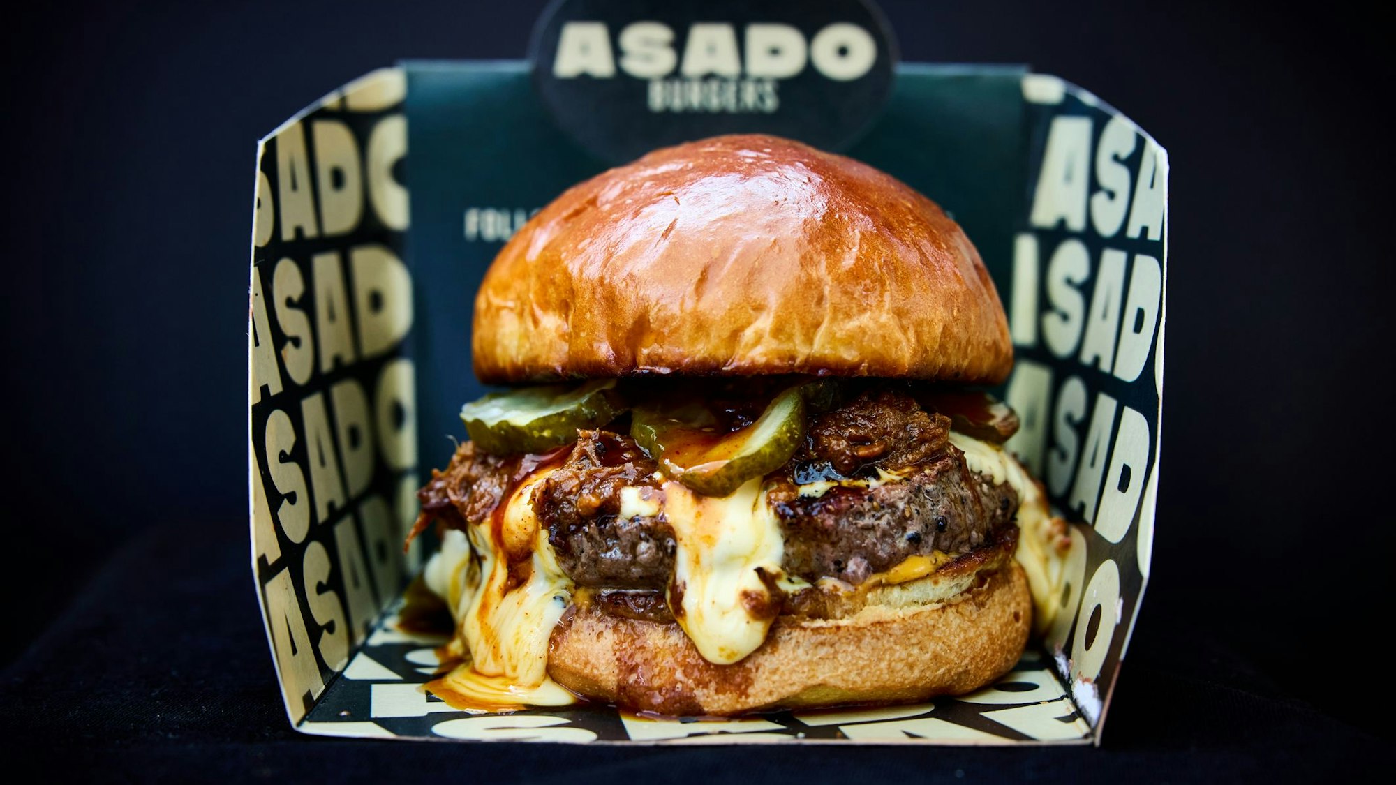 Burger in Pappbox von Asado