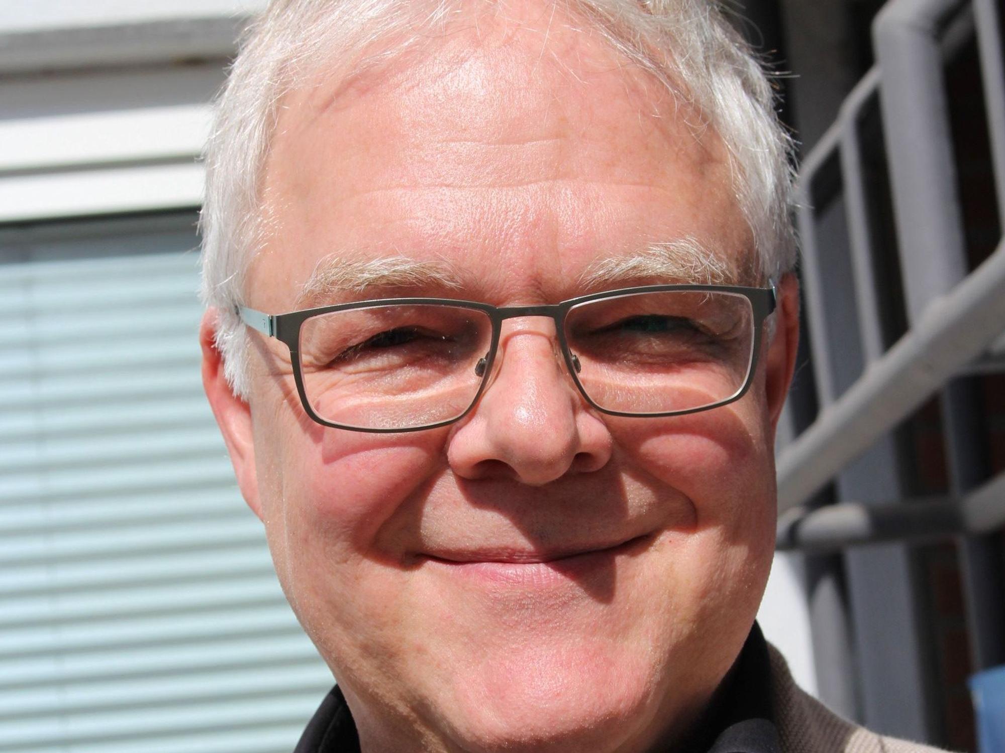 Porträtbild von Ralf Holtkötter.