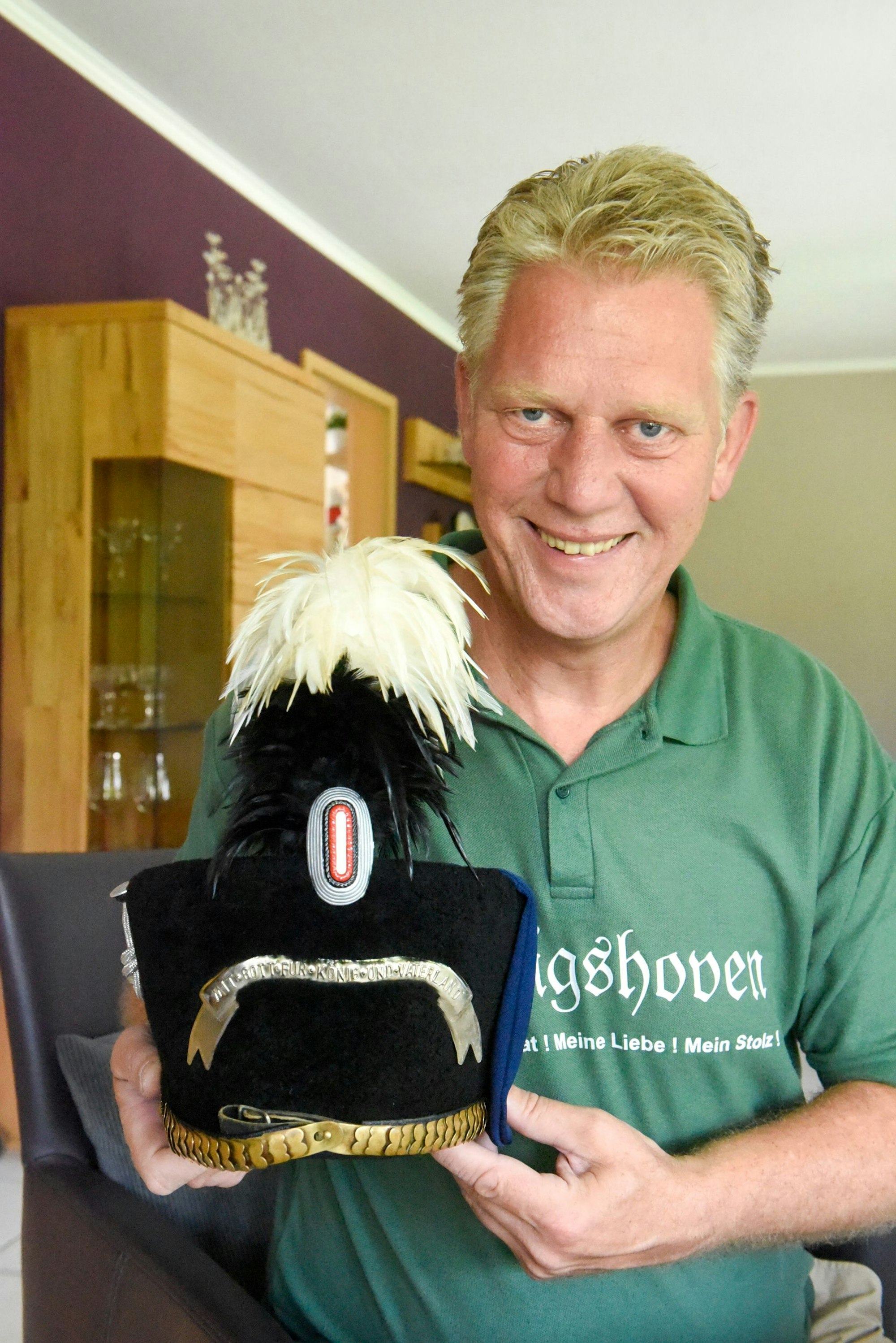 Auf dem Bild ist ein Schütze mit seinem Uniformhut zu sehen.