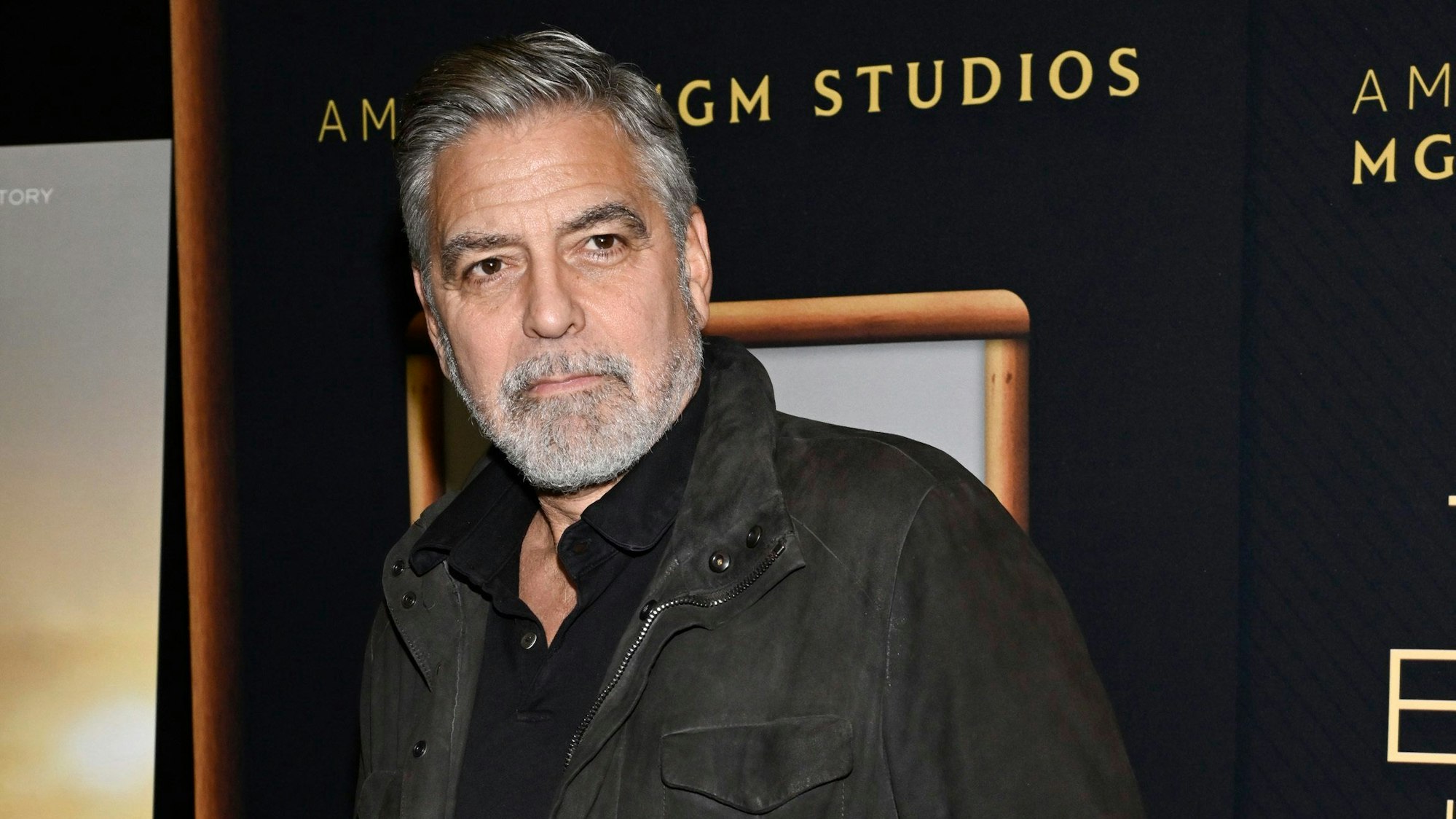 FILE - Director George Clooney attends a special screening of "The Boys in the Boat," Dec. 13, 2023, in New York. Movie star and lifelong Democrat George Clooney is adding his voice to calls for Joe Biden to leave the presidential race. Clooney says in a New York Times opinion piece Wednesday that he loves Biden, but the party would lose the presidential race as well as any control in Congress with him as the nominee. (Photo by Evan Agostini/Invision/AP, File)