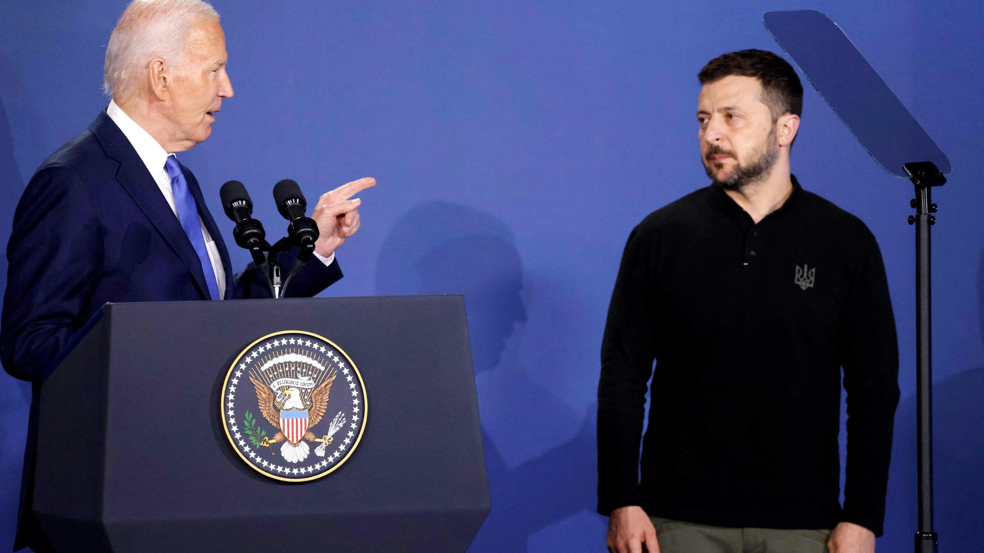 TOPSHOT - US President Joe Biden speaks alongside Ukraine's President Volodymyr Zelensky (R) during the Ukraine Compact initiative on the sidelines of the NATO Summit at the Walter E. Washington Convention Center in Washington, DC, on July 11, 2024. (Photo by Ludovic MARIN / AFP)
