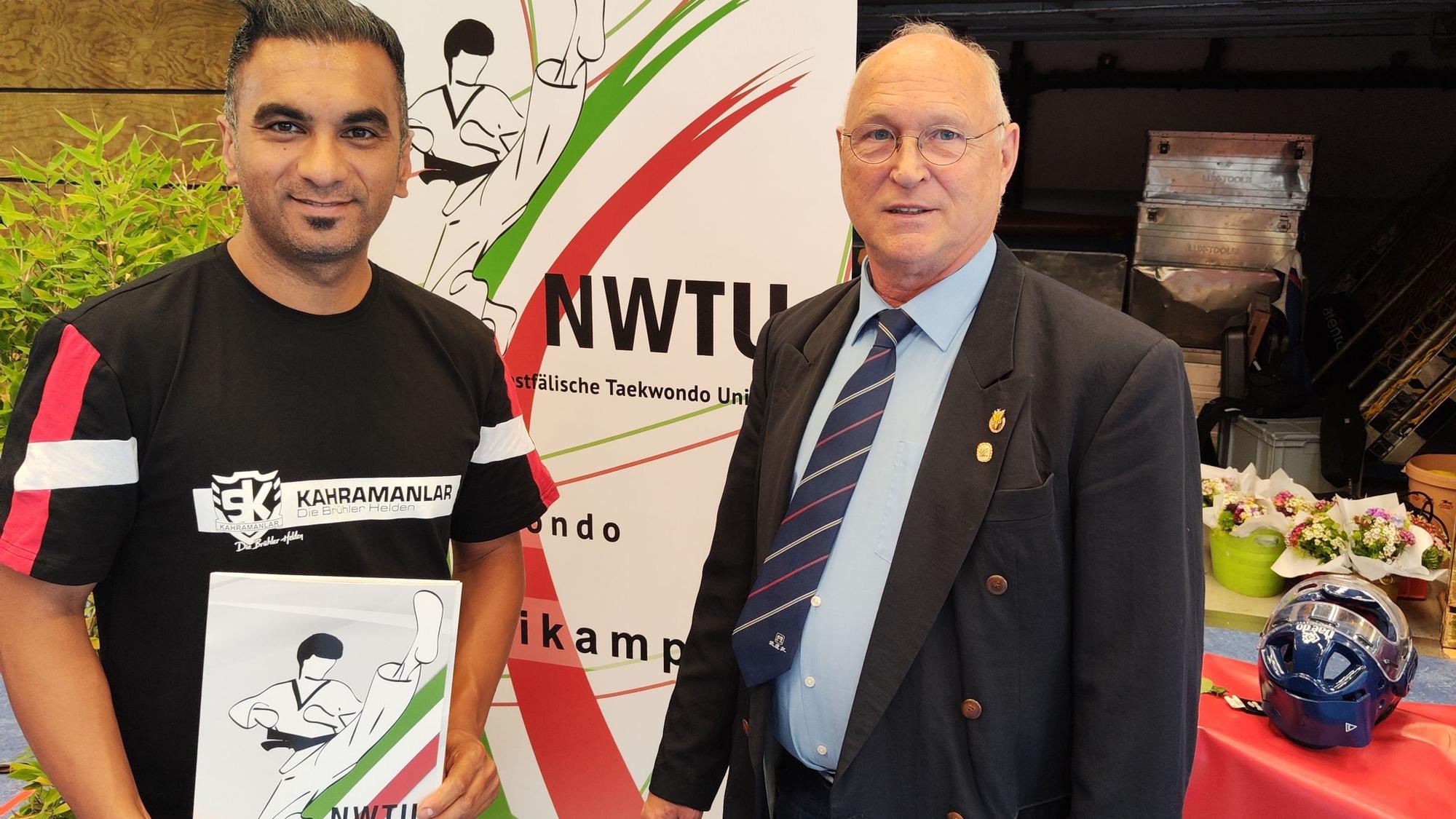 Zu sehen sind Fatih Türk und Thomas Schneider.