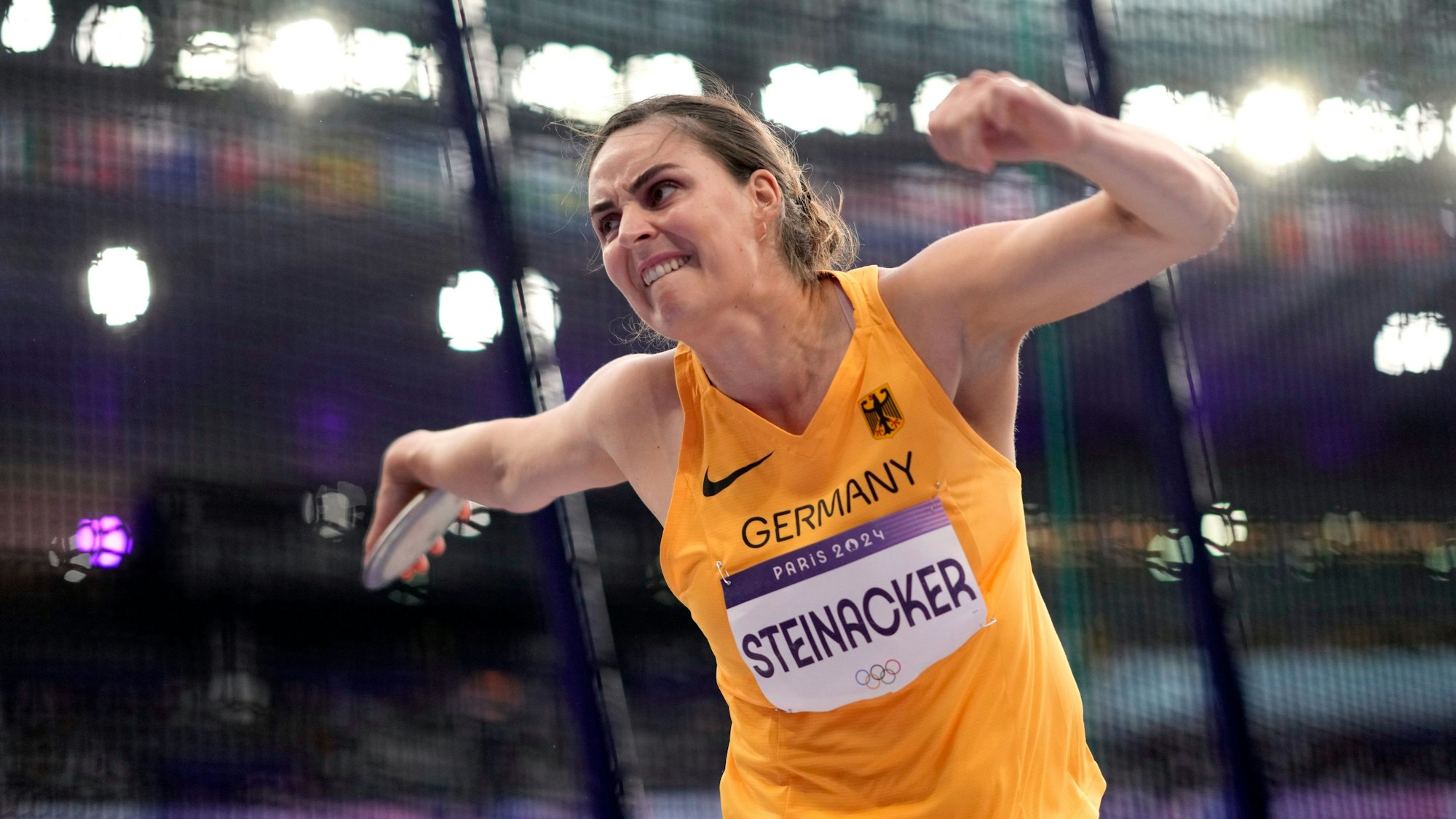 Marike Steinacker, of Germany, makes an attempt in the women's discus throw qualification at the 2024 Summer Olympics, Friday, Aug. 2, 2024, in Saint-Denis, France. (AP Photo/Bernat Armangue)