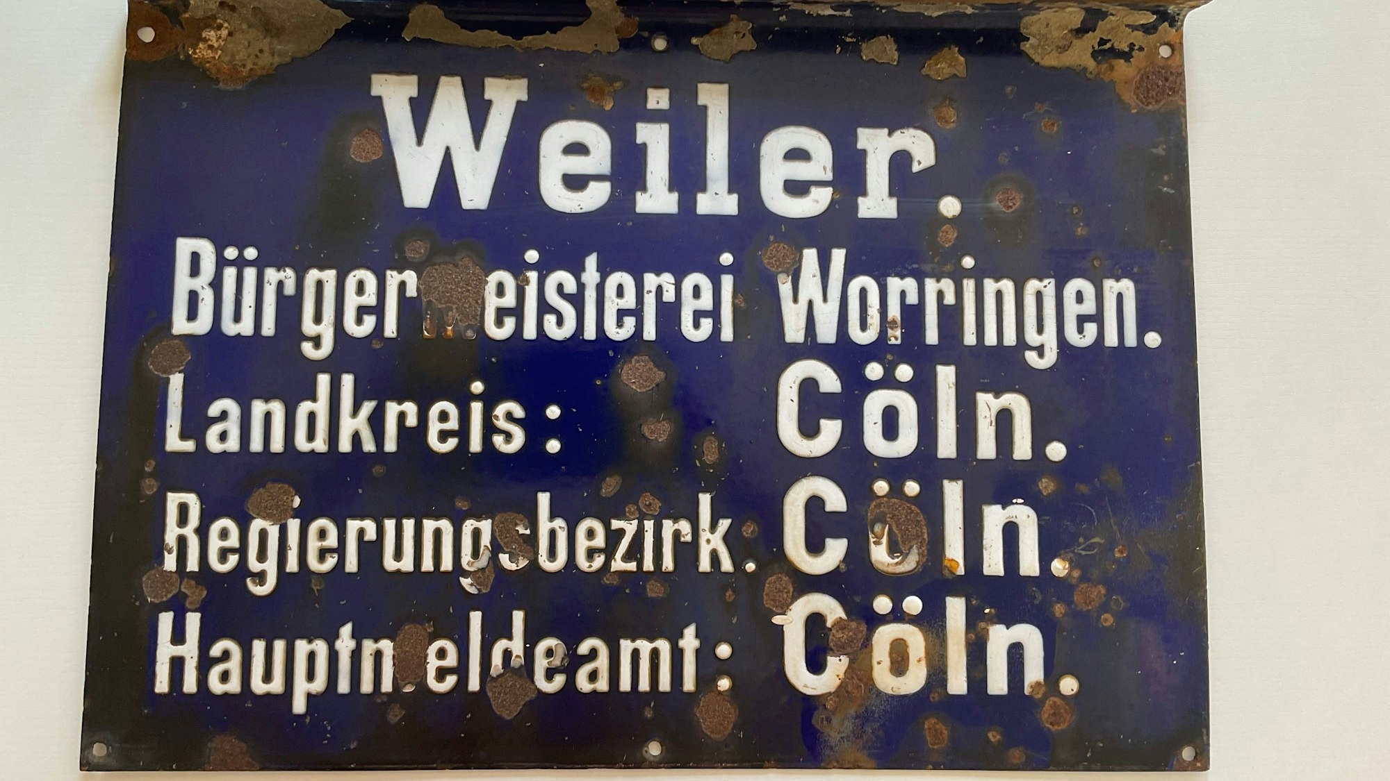 Dieses Ortsschild war bis zur Eingemeindung der Bürgermeisterei Worringen in Köln im Jahr 1922 in Gebrauch.