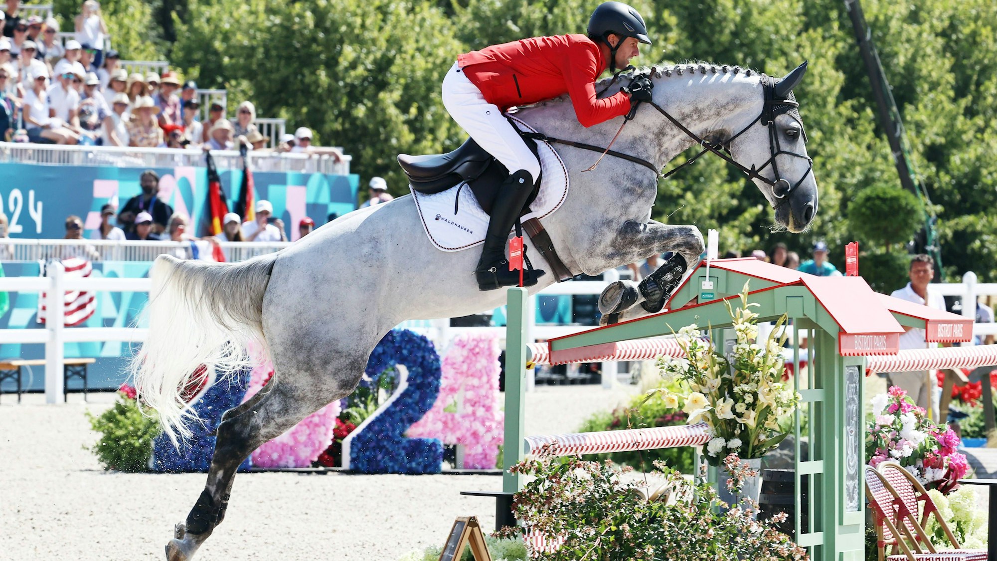 Olympiasieger Christian Kukuk auf seinem Pferd Checker waehrend der Springpruefung bei den Olympischen Sommerspielen in Paris.