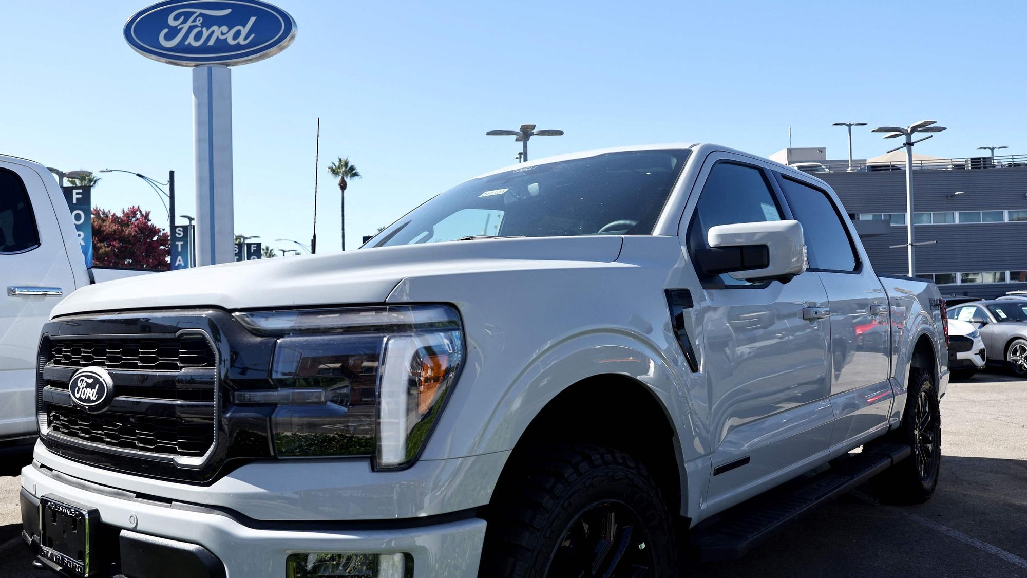 GLENDALE, CALIFORNIA - AUGUST 21: A Ford F-150 Lariat PowerBoost ybrid pickup truck is displayed for sale at a Ford dealership on August 21, 2024 in Glendale, California. Ford announced it is upending its electric vehicle (EV) strategy for North American vehicles to focus on hybrids, affordability, and longer ranges. Mario Tama/Getty Images/AFP (Photo by MARIO TAMA / GETTY IMAGES NORTH AMERICA / Getty Images via AFP)