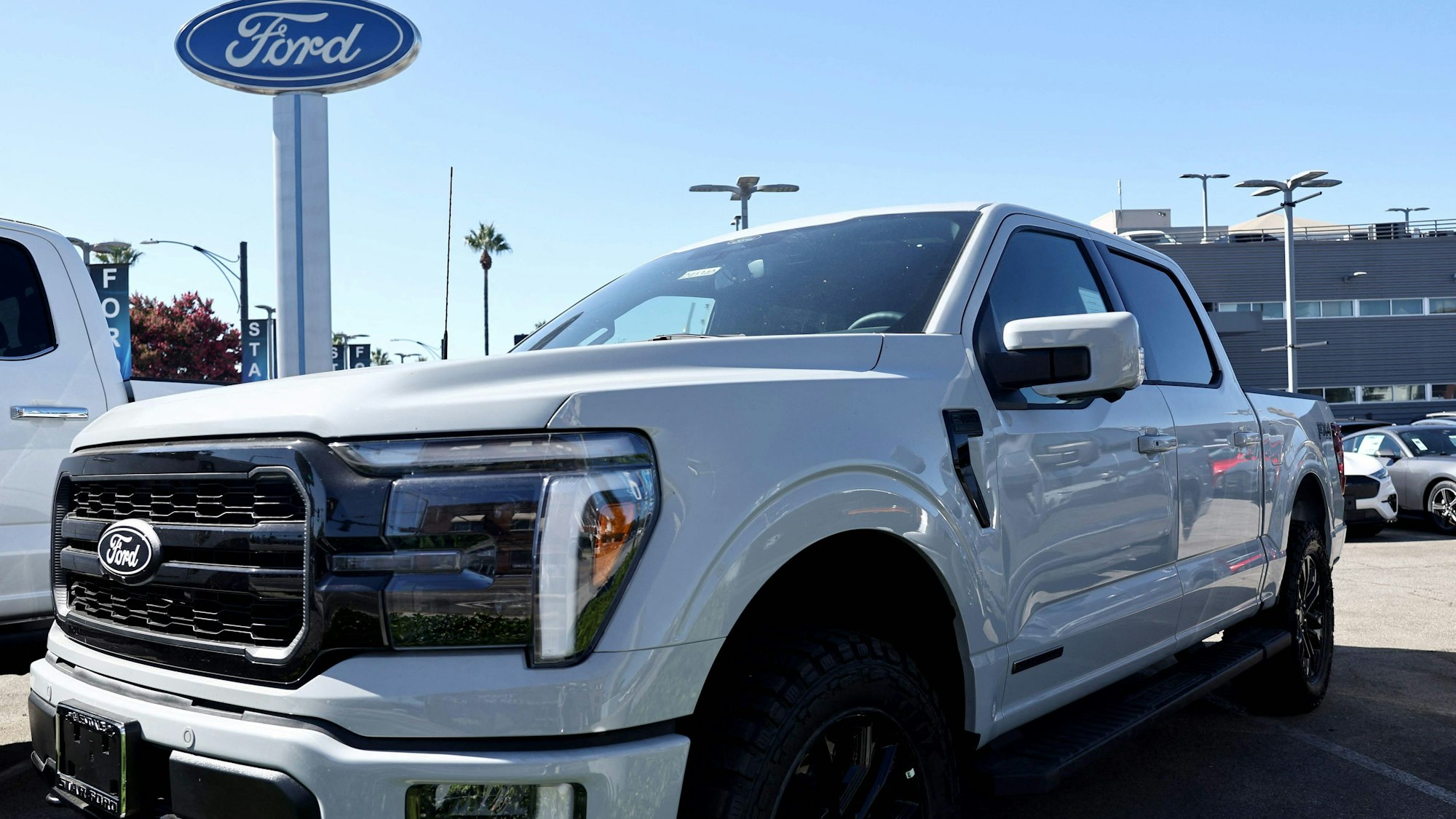 GLENDALE, CALIFORNIA - AUGUST 21: A Ford F-150 Lariat PowerBoost ybrid pickup truck is displayed for sale at a Ford dealership on August 21, 2024 in Glendale, California. Ford announced it is upending its electric vehicle (EV) strategy for North American vehicles to focus on hybrids, affordability, and longer ranges. Mario Tama/Getty Images/AFP (Photo by MARIO TAMA / GETTY IMAGES NORTH AMERICA / Getty Images via AFP)