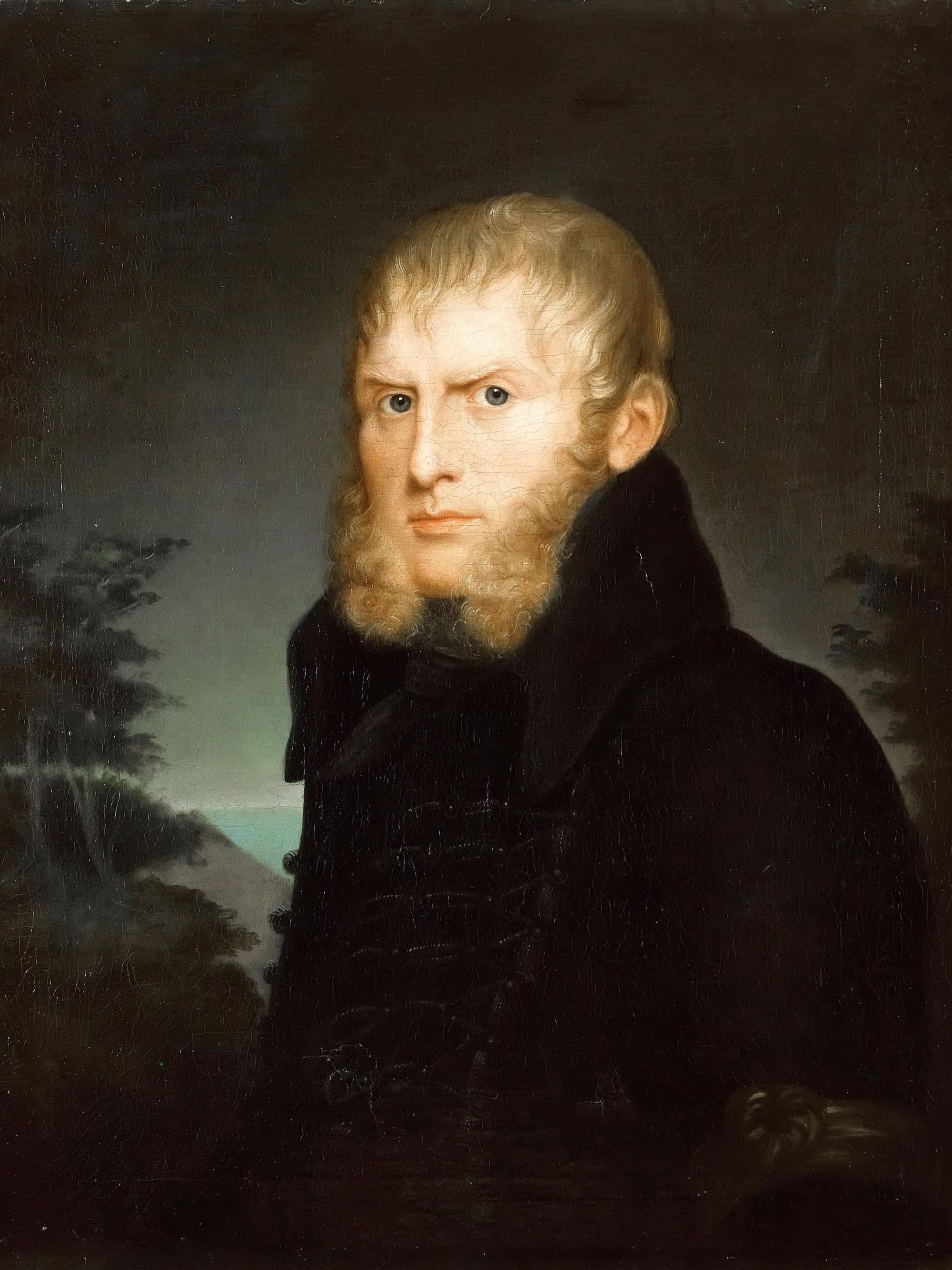 Caspar David Friedrich trägt eine Trauerbinde und blickt uns an.
