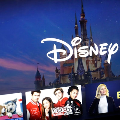 FILE - A Disney logo forms part of a Disney Plus menu on a computer screen in Walpole, Mass., on Nov. 13, 2019. (AP Photo/Steven Senne, File)