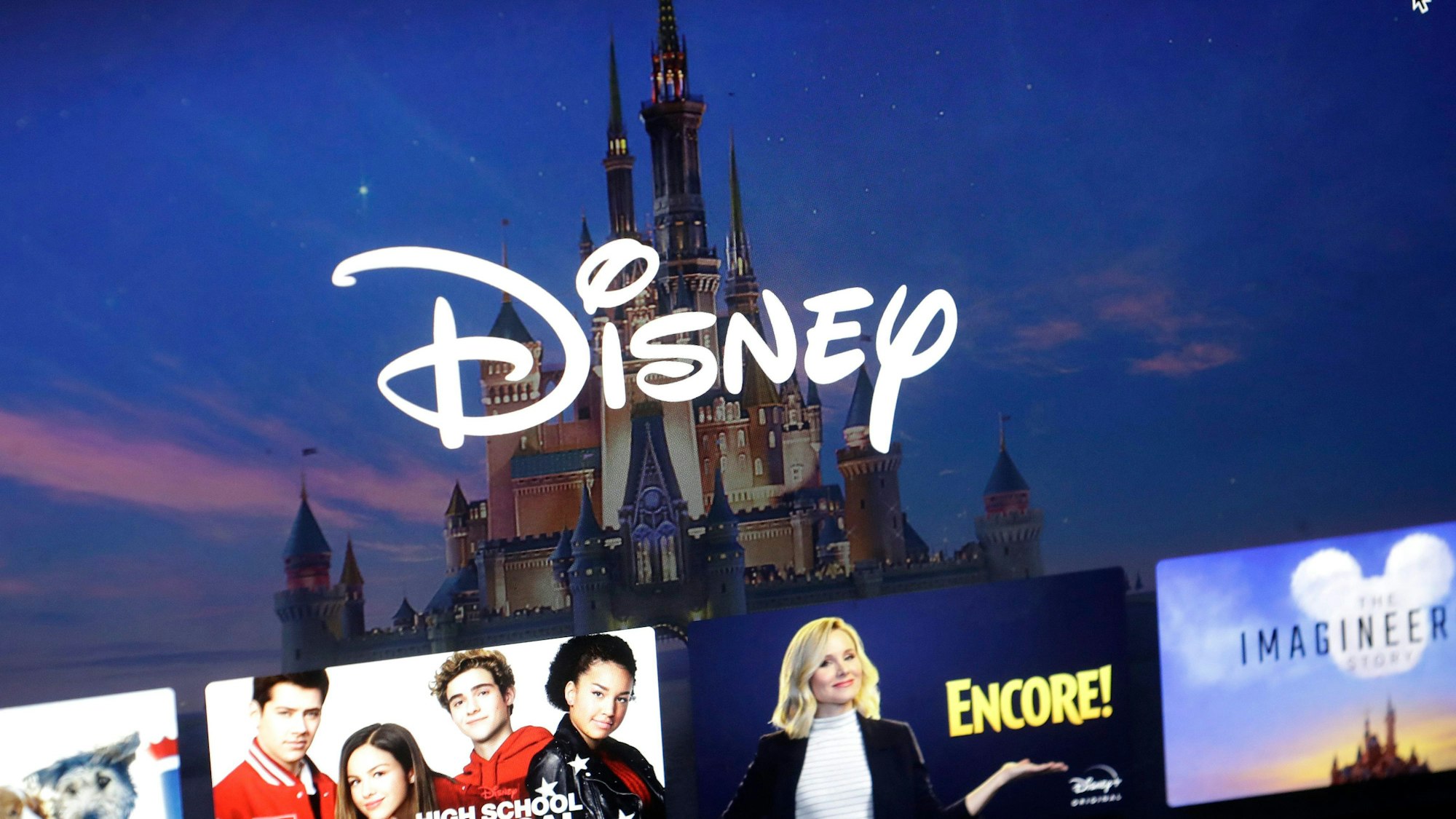 FILE - A Disney logo forms part of a Disney Plus menu on a computer screen in Walpole, Mass., on Nov. 13, 2019. (AP Photo/Steven Senne, File)