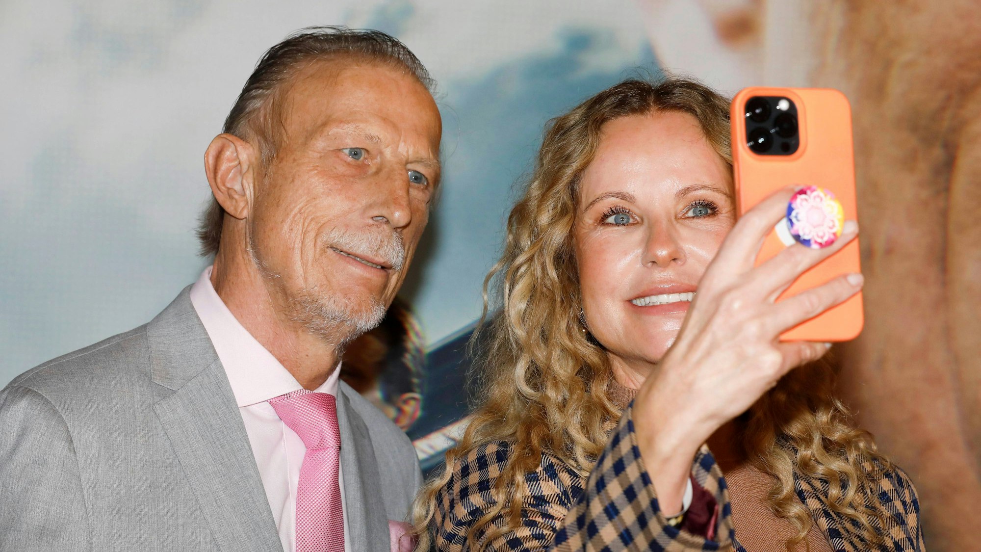 Christoph Daum (l.) und Katja Burkard bei der Premiere des Dokumentarfilms über die Trainer-Legende im Kölner Residenz-Kino.