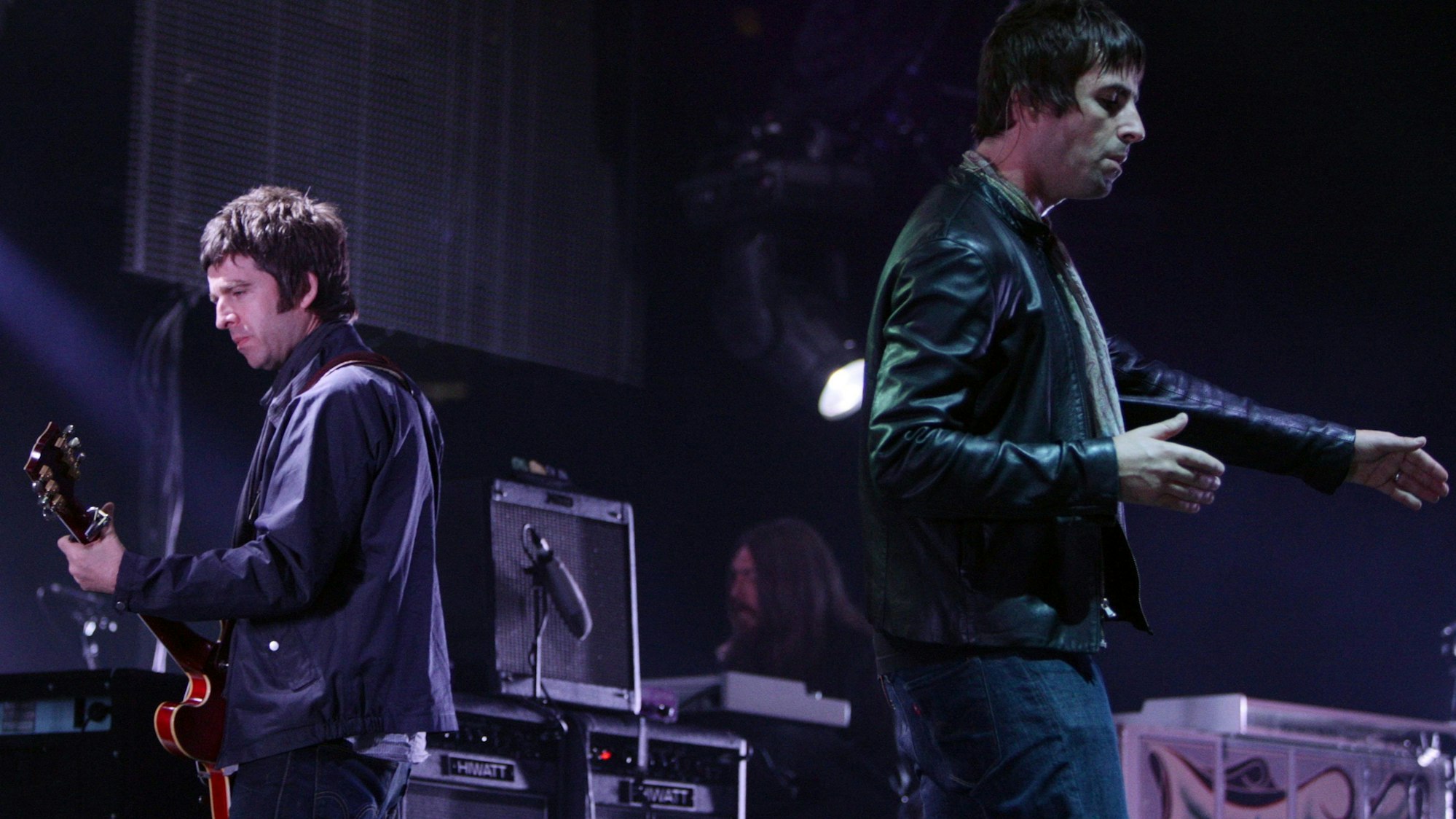 FILE - Noel, left, and Liam Gallagher, of Oasis, perform during the start of their Canadian tour in Vancouver, B.C., on Aug. 27, 2008. (Darryl Dyck/The Canadian Press via AP, File)