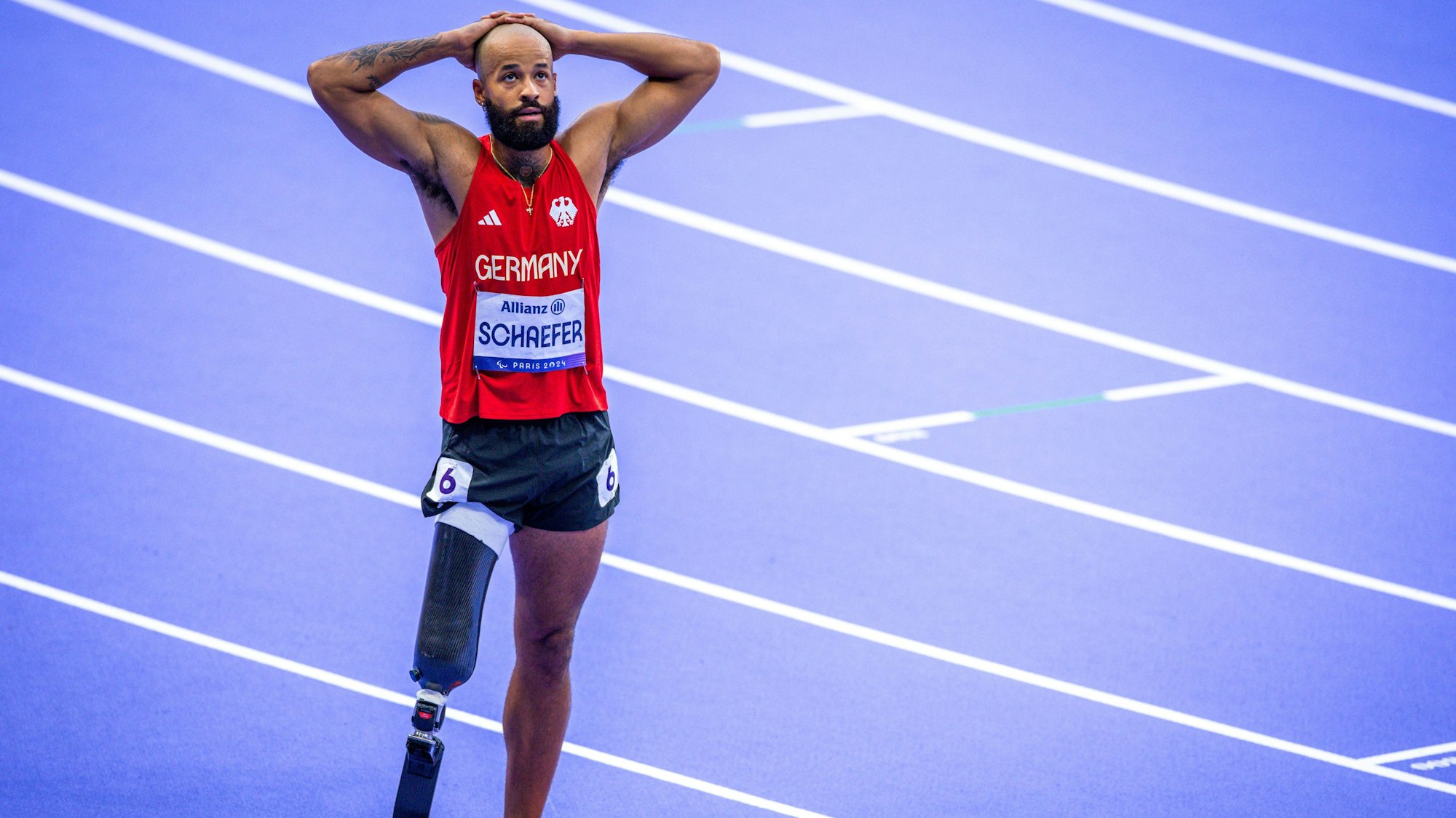 Leon Schäfer aus Deutschland reagiert auf seinen knappen vierten Platz.