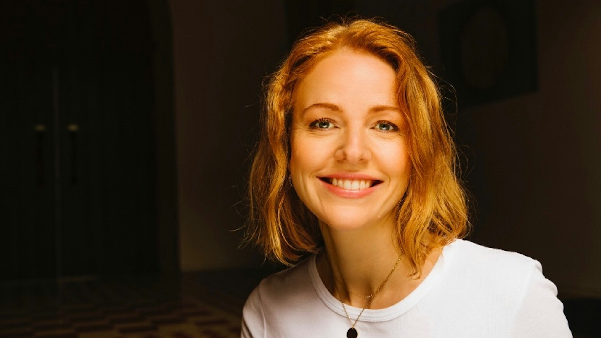 Sina Kloke lächelt in die Kamera.