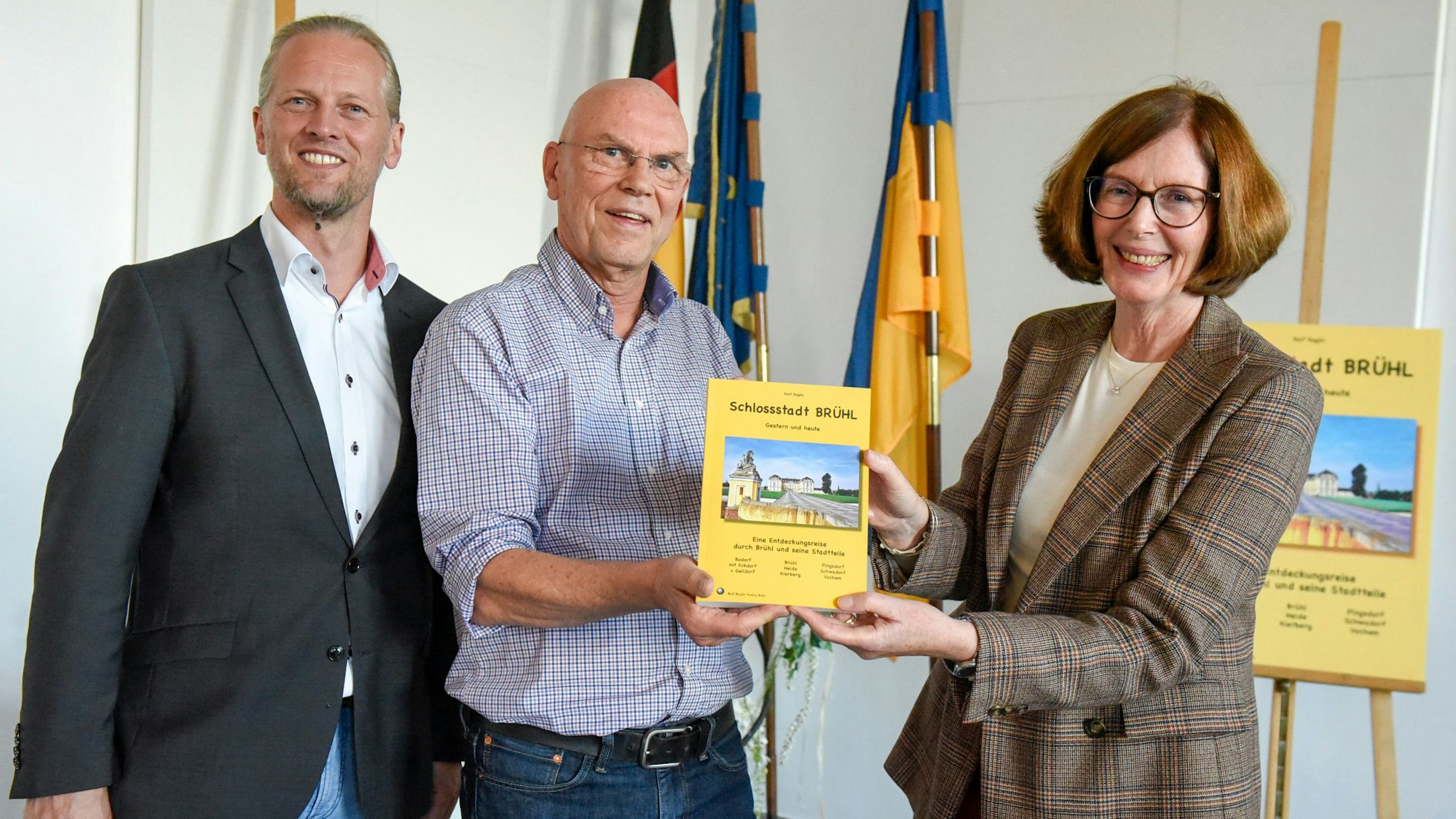 Zu sehen sind Ralf Reglin, Alexander Entius und Pia Regh.