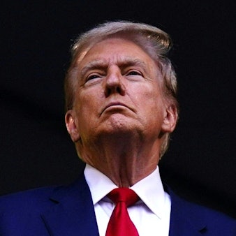 TOPSHOT - Former US President and Republican presidential candidate Donald Trump (L) and US Senator from Ohio and Republican vice presidential candidate J.D. Vance attend a remembrance ceremony on the 23rd anniversary of the September 11 terror attack on the World Trade Center at Ground Zero, in New York City on September 11, 2024. (Photo by Adam GRAY / AFP)