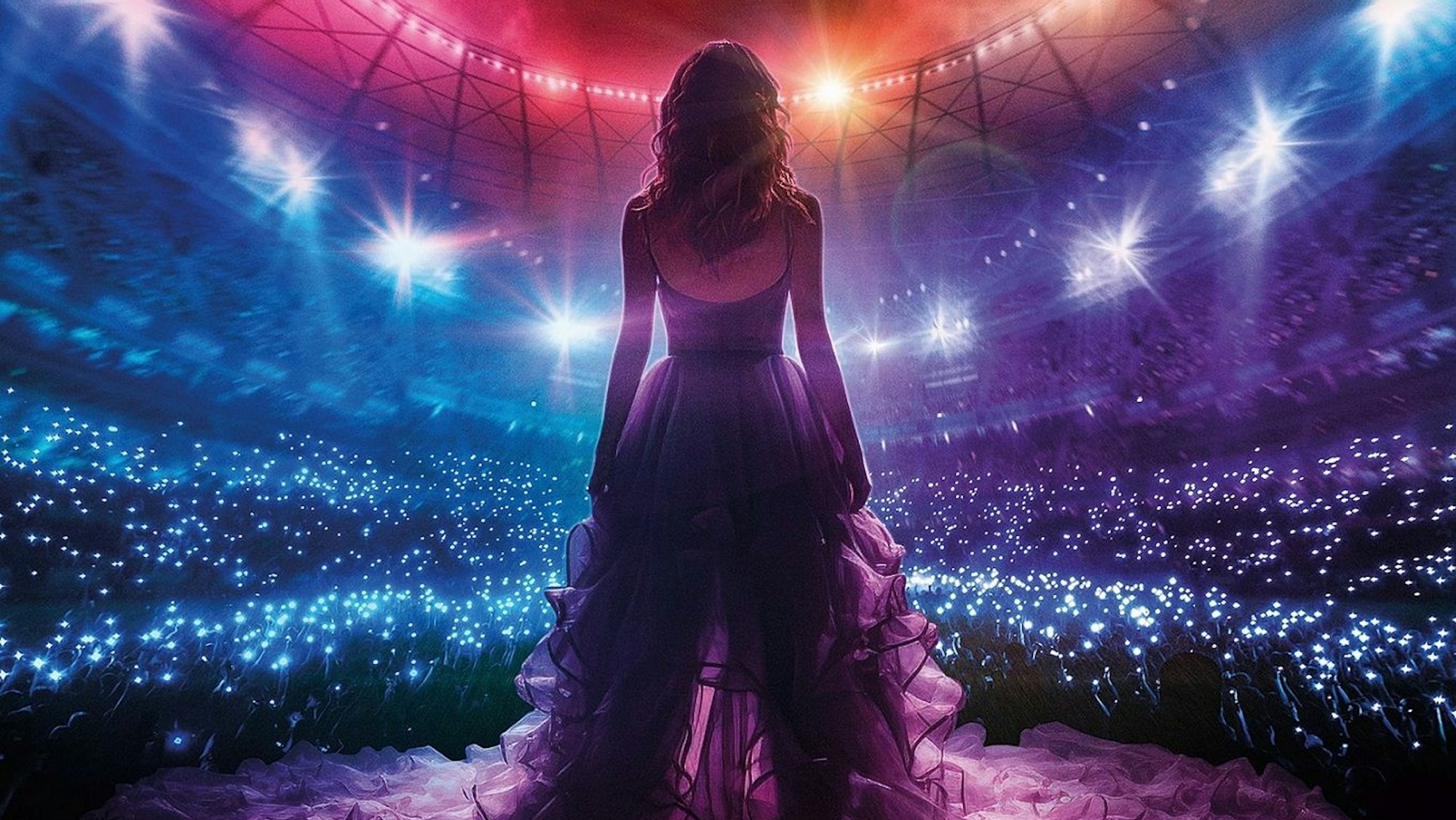 Eine Sängerin steht auf der Bühne einer Arena.