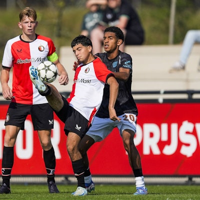 UEFA Youth League: Feyenoord U19 v Bayer 04 Leverkusen U19 Rotterdam - Nassim El Harmouz of Feyenoord O19, Francis Onyeka of Bayer 04 Leverkusen O19 during the first round of new format of the Youth League 2024/2025. The match is set between Feyenoord U19 and Bayer 04 Leverkusen U19 at Nieuw Varkenoord on 19 September 2024 in Rotterdam, The Netherlands. Copyright: xTomxBodex