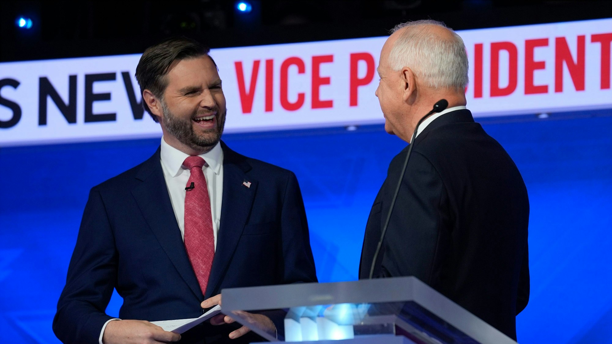 Republican vice presidential nominee Sen. JD Vance, R-Ohio, talks with Democratic vice presidential candidate Minnesota Gov. Tim Walz after the vice presidential debate hosted by CBS News Tuesday, Oct. 1, 2024, in New York. (AP Photo/Matt Rourke)