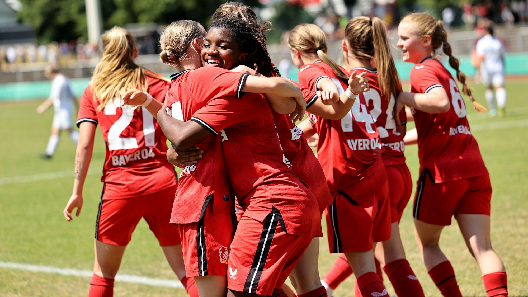 BERGISCH-GLADBACH, GERMANY - JUNE 17: Delice Boboy of Leverkusen celebrates the first goal (C) with her team mates during the B-Junior Girls Final German Championship Final between Bayer Leverkusen and SpVg Aurich at BELKAW Arena on June 17, 2023 in Bergisch-Gladbach, Germany. (Photo by Christof Koepsel/Getty Images for DFB)