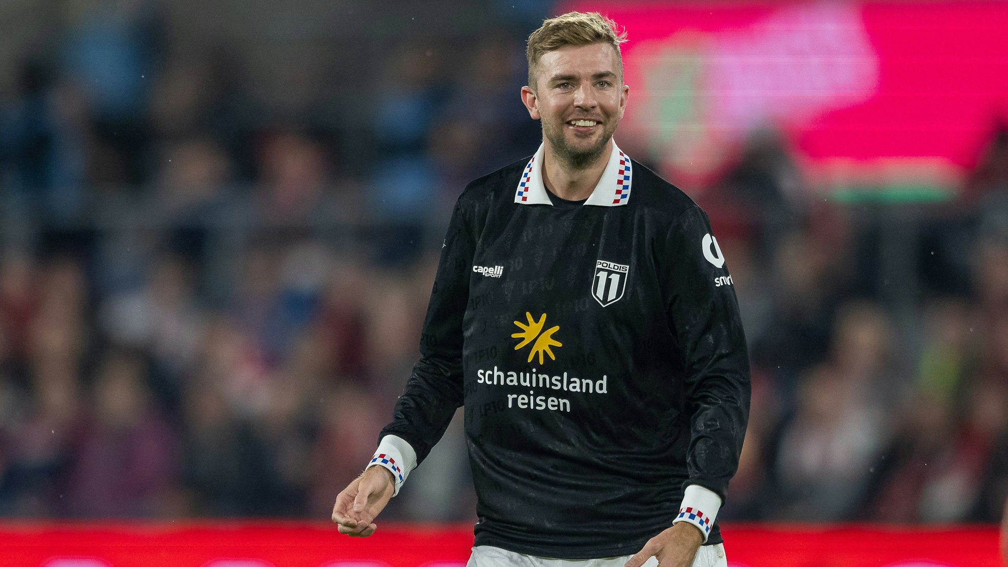 Christoph Kramer Team Poldi ist in Köln gut gelaunt auf dem Rasen. Abseits des Spielfeldes teilte der Ex-Gladbacher seine Erinnerungen bezüglich des Kölner Weltmeisters.