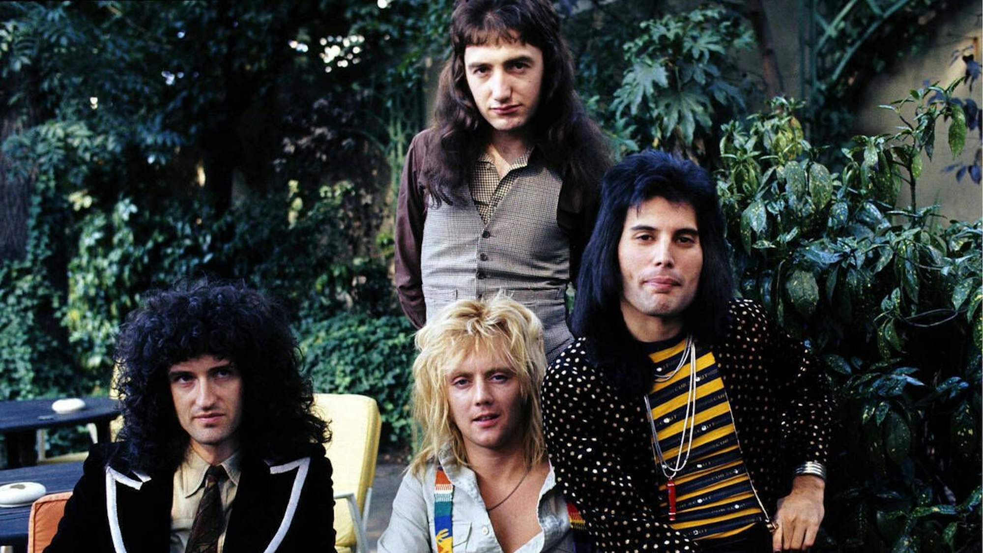 Queen im Jahr 1976: John Deacon (o), Brian May (l), Roger Taylor (m) und Freddie Mercury (r).