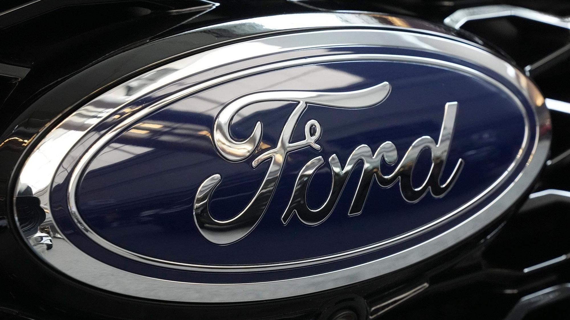 FILE - The Ford logo is seen on the grill of a Ford Explorer on display at the Pittsburgh International Auto Show in Pittsburgh, on Feb. 15, 2024. (AP Photo/Gene J. Puskar, File)