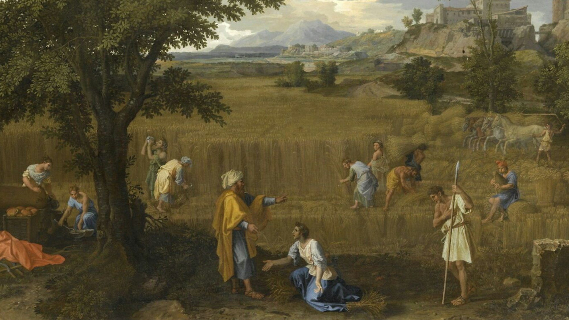 Menschen auf dem Feld bei der Erntearbeit.