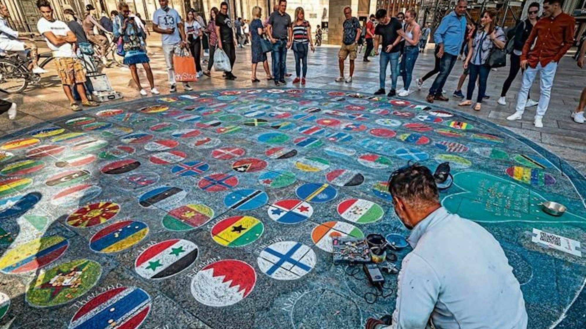 Ein Flaggenmaler am Dom