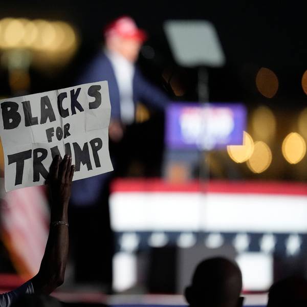 FILE - A supporter holds up a sign as Republican presidential candidate former President Donald Trump speaks at a campaign rally at Trump National Doral Miami, July 9, 2024, in Doral, Fla. (AP Photo/Rebecca Blackwell, File)