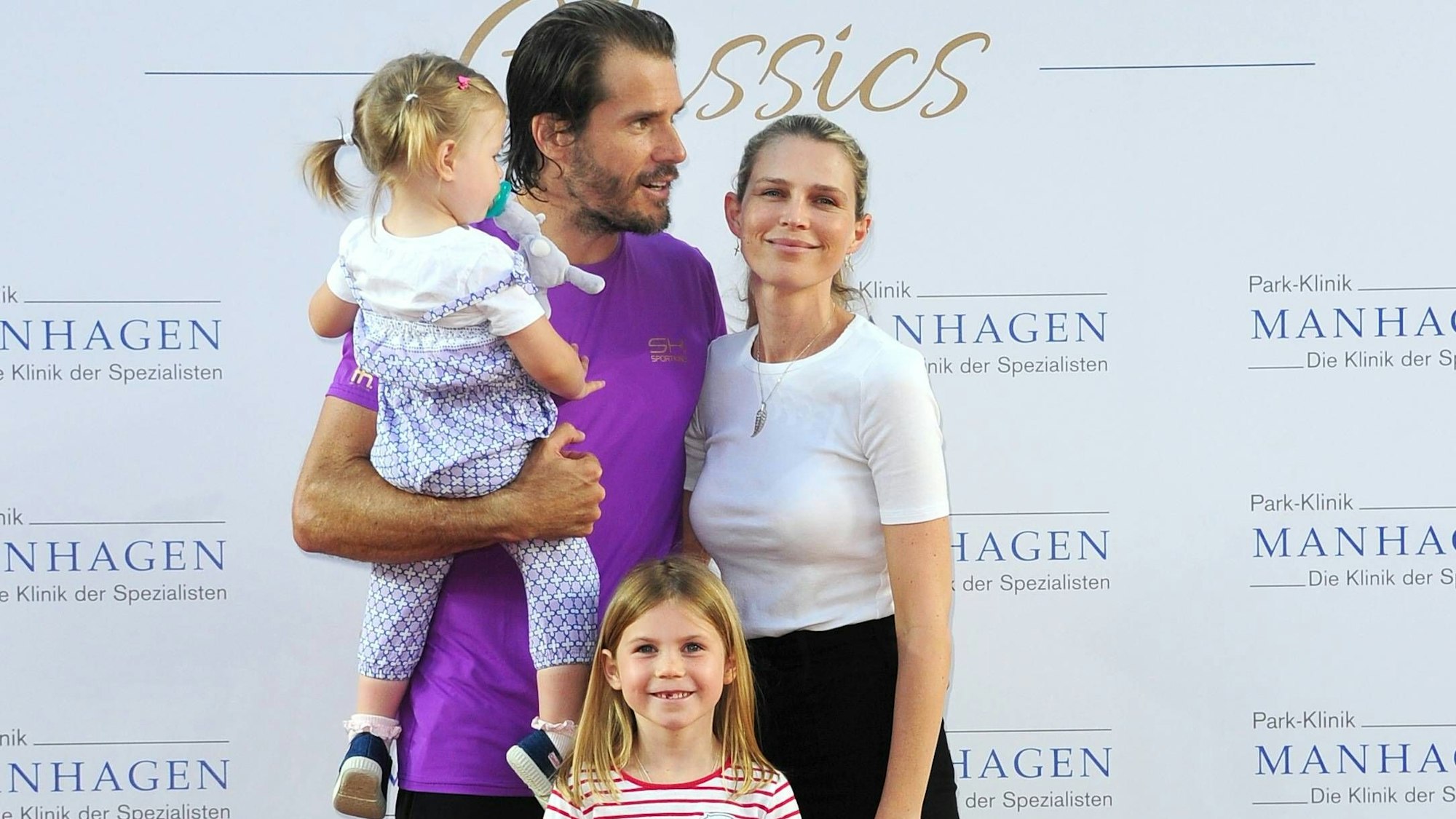 Tommy Haas mit Tochter Josephine, Tochter Valentine und seiner Verlobten Sara Foster am Rothenbaum in Hamburg.