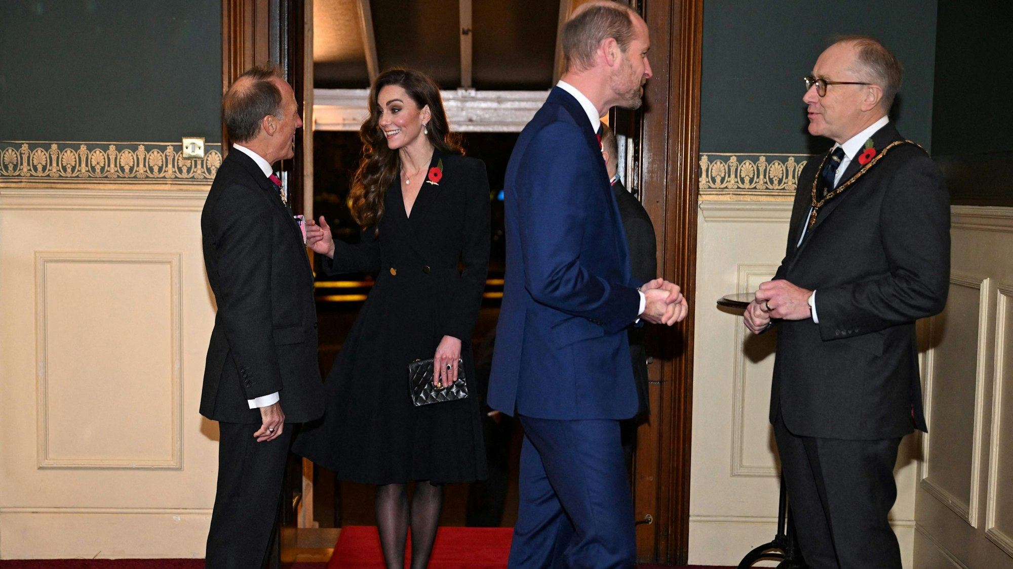 Britain's Catherine, Princess of Wales (2L) and Britain's Prince William, Prince of Wales (2R) attend "The Royal British Legion Festival of Remembrance" ceremony at Royal Albert Hall, in London, on November 9, 2024 as part of the Remembrance Day commemorating the end of World War I. (Photo by Chris J RATCLIFFE / POOL / AFP)