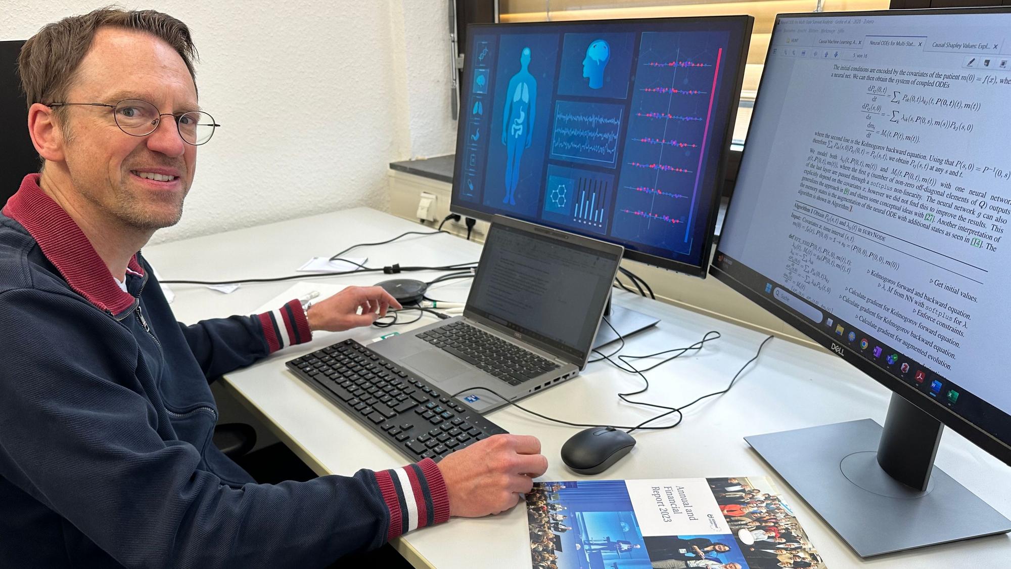 Professor Holger Fröhlich vom Fraunhofer-Institut in Birlinghoven leitet die Zusammenarbeit mit der Stiftung von Bill Gates. Er sitzt an seinem Schreibtisch und wertet gerade Testdaten aus.,