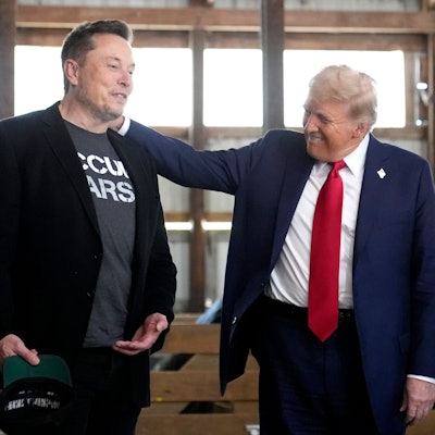 FILE - Tesla and SpaceX CEO Elon Musk, left, and Republican presidential nominee former President Donald Trump attend a campaign event at the Butler Farm Show on Oct. 5, 2024, in Butler, Pa. (AP Photo/Alex Brandon, File)