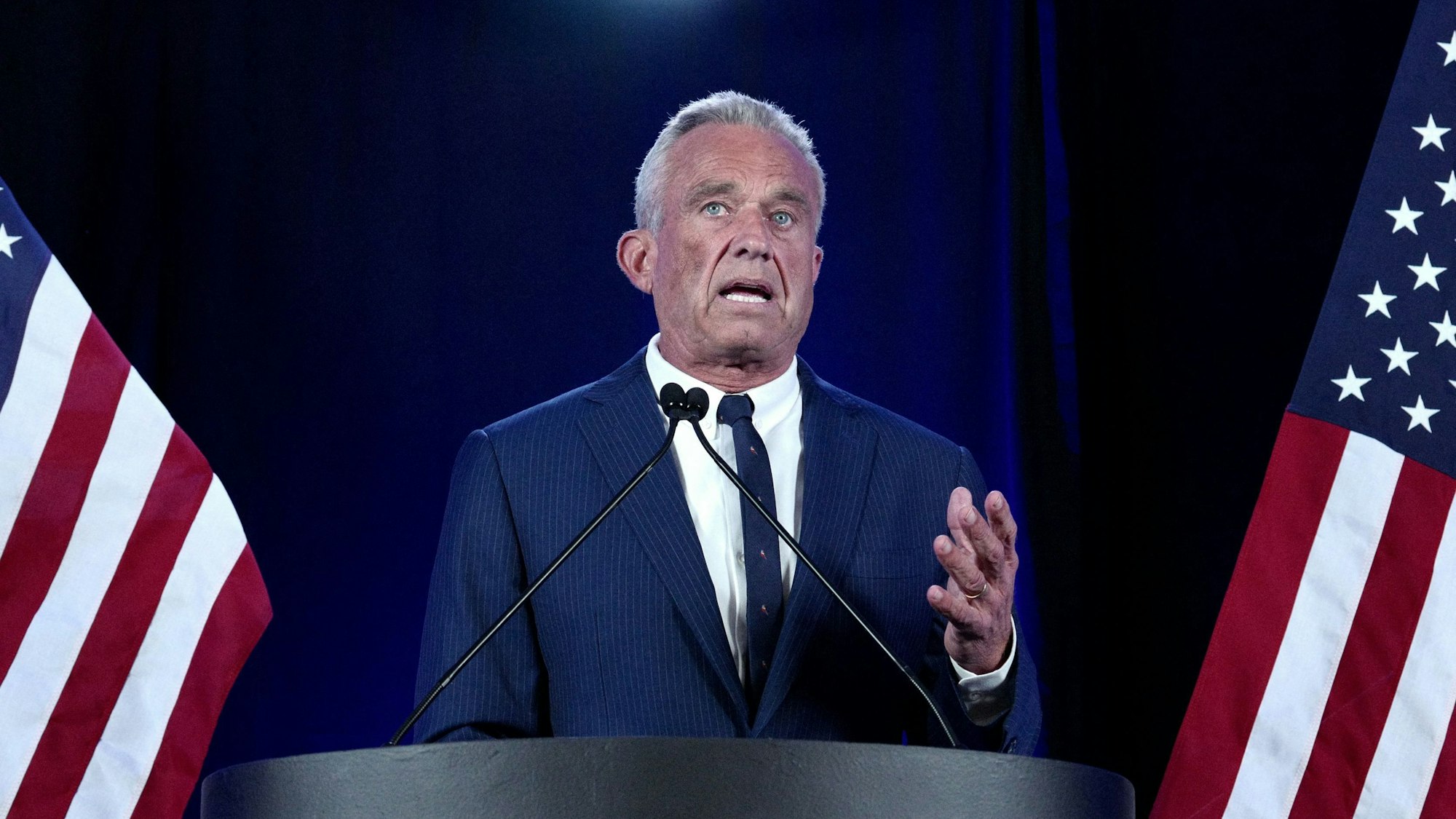 (FILES) Independent presidential candidate Robert F. Kennedy Jr. speaks in Phoenix, Arizona, August 23, 2024. US President-elect Donald Trump announced on Thursday that he is nominating Kennedy to be the US Secretary of Health and Human Services. (Photo by Olivier Touron / AFP)