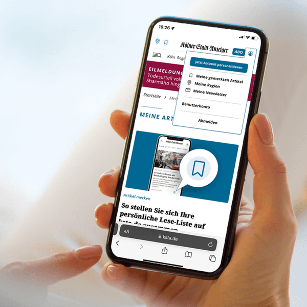 Ein Smartphone-Display zeigt die Bookmark-Funktion auf ksta.de.