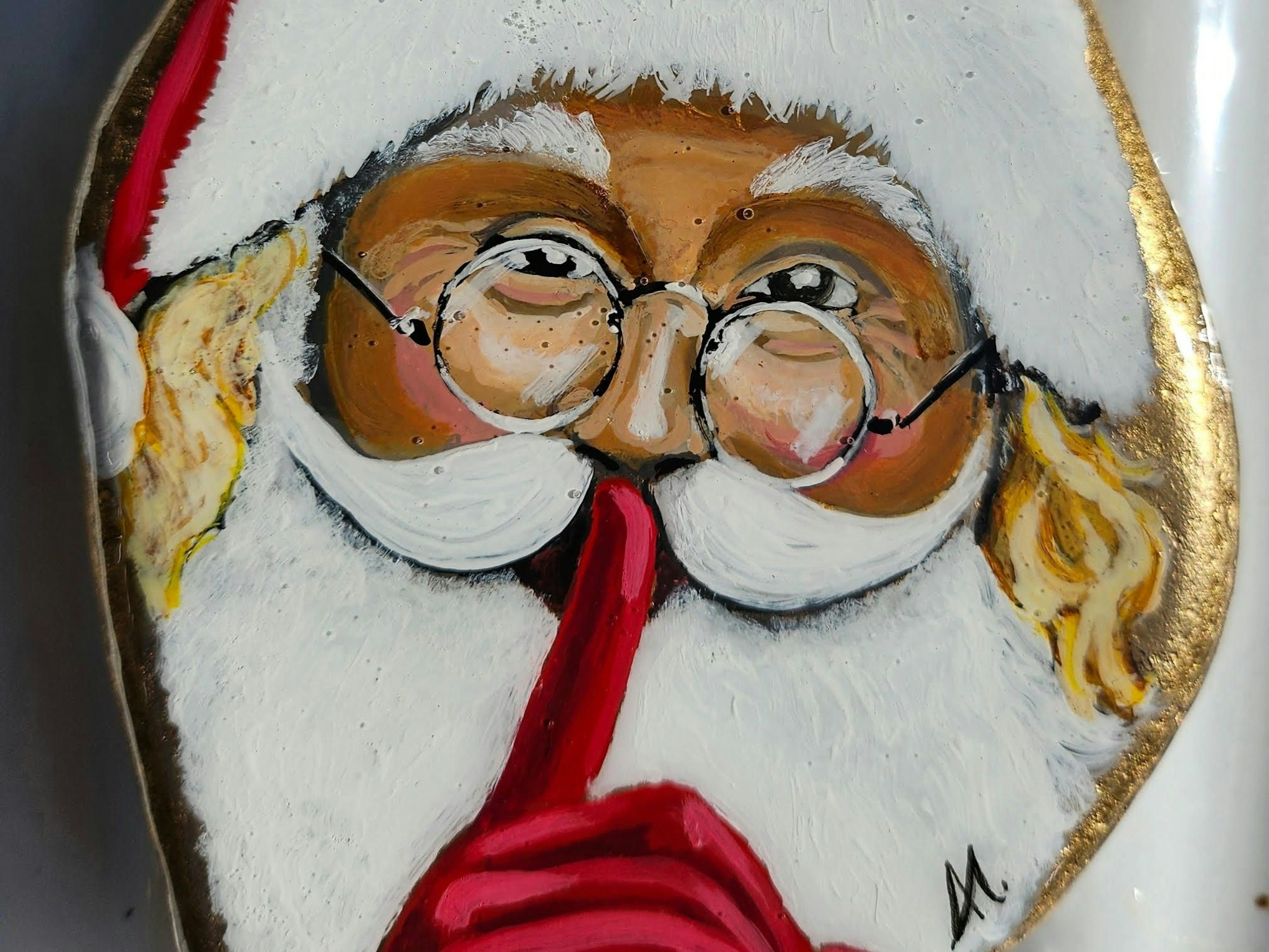 Opladenerin Andrea May bemalt Steine