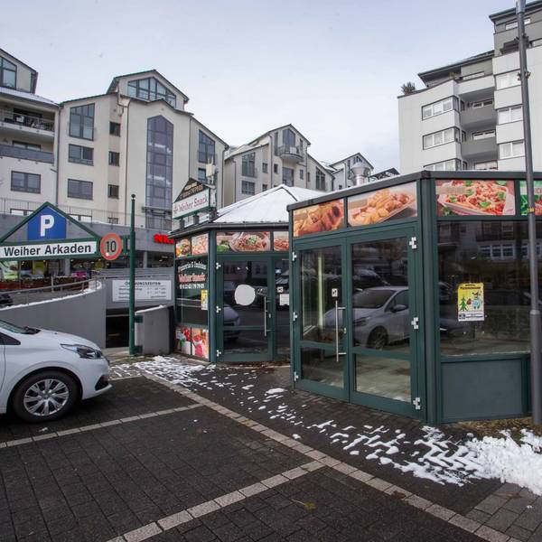 Ein gläserner Pavillon.