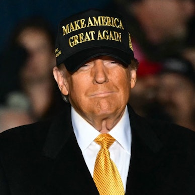 (FILES) Former US President Republican presidential candidate Donald Trump arrives, more than 3 hours late, to a campaign rally in Traverse City, Michigan on October 25, 2024. Donald Trump's victory in the US presidential election, the continuing war in the Middle East or the Paris Olympics... are among the twelve events that marked the year 2024. (Photo by Jim WATSON / AFP)