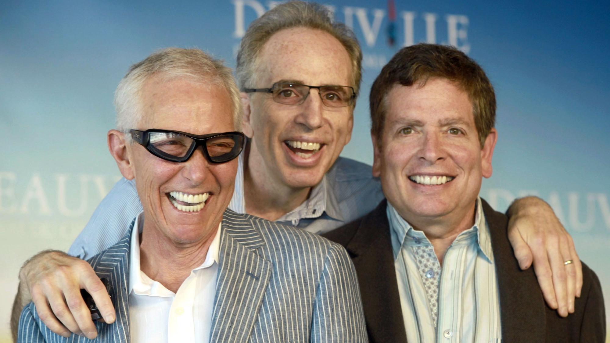 Jim Abrahams (l-r), Jerry Zucker und David Zucker, auch als ZAZ bekannt, lachen am 08.09.2009 in Deauville (Frankreich) beim 35. Amerikanischen Filmfestival.