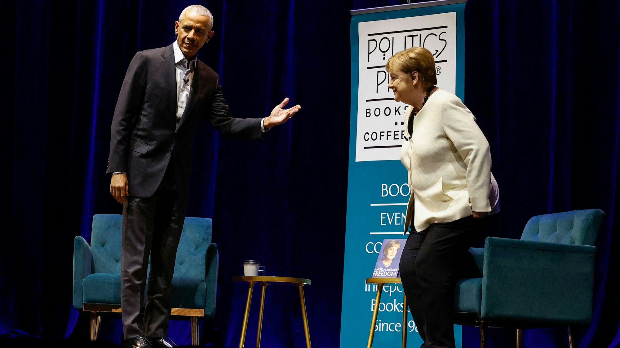 WASHINGTON, DC - DECEMBER 02: Former U.S. President Barack Obama introduces former German Chancellor Angela Merkel as they participate in a book talk at The Anthem on December 02, 2024 in Washington, DC. Obama and Merkel discussed her memoir "Freedom" as well as world politics and the history the leaders have witnessed.   Kevin Dietsch/Getty Images/AFP (Photo by Kevin Dietsch / GETTY IMAGES NORTH AMERICA / Getty Images via AFP)